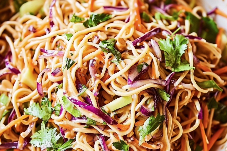 This vibrant Asian Noodle Salad is bursting with flavor and crunch, making it a perfect dish for any occasion, from picnics to quick lunches. The peanut dressing takes it over the top!