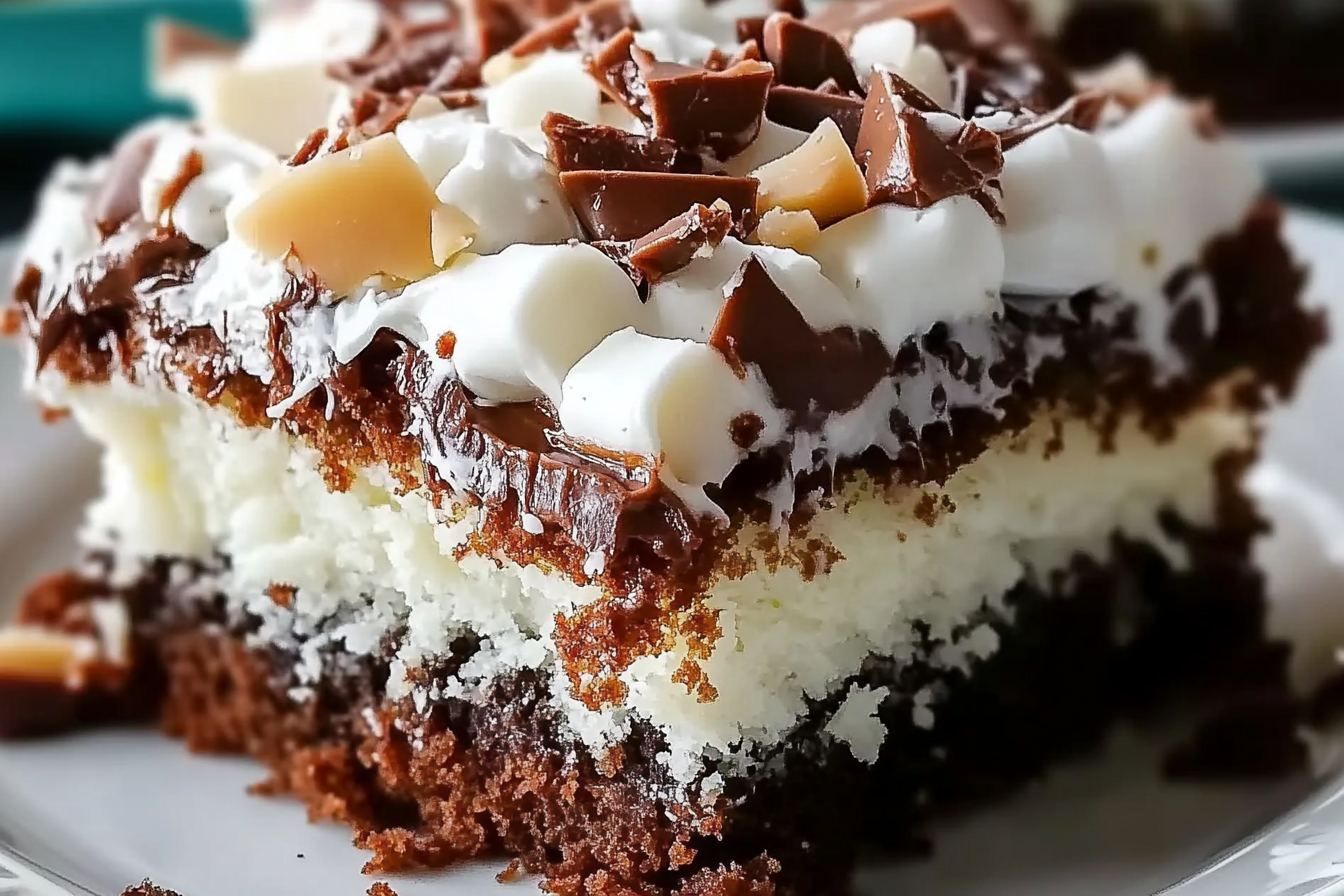 Indulge in the rich flavors of this Mounds Poke Cake, a delightful dessert that combines chocolate, coconut, and sweetened condensed milk into a creamy, irresistible treat perfect for any occasion.