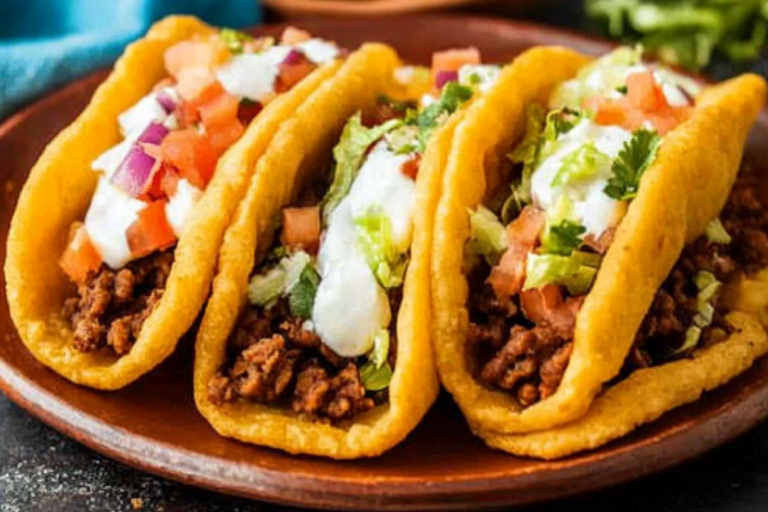 Experience the delicious combination of savory and sweet with Navajo Tacos, featuring homemade fry bread and fresh toppings for a meal that satisfies every craving.