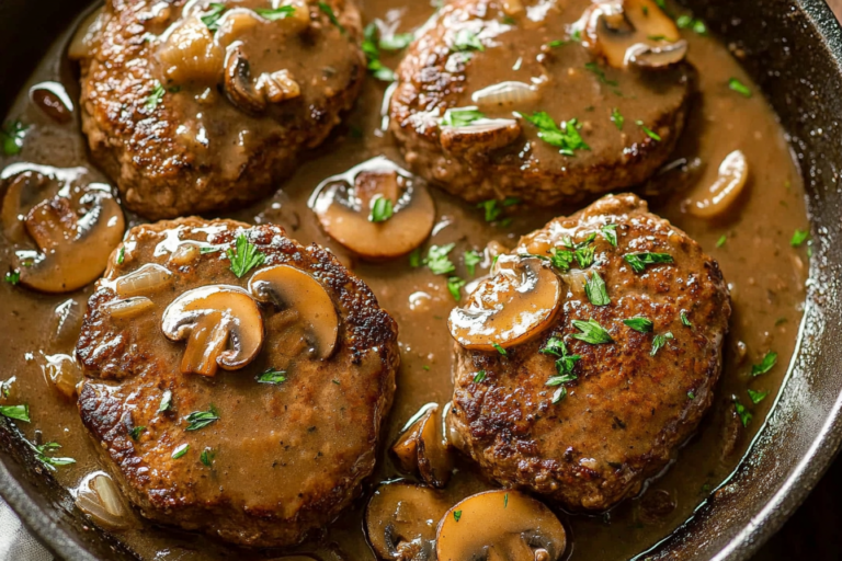 Savor the comforting flavors of Salisbury Steak in Mushroom Onion Gravy, perfect for family dinners and meal prep!