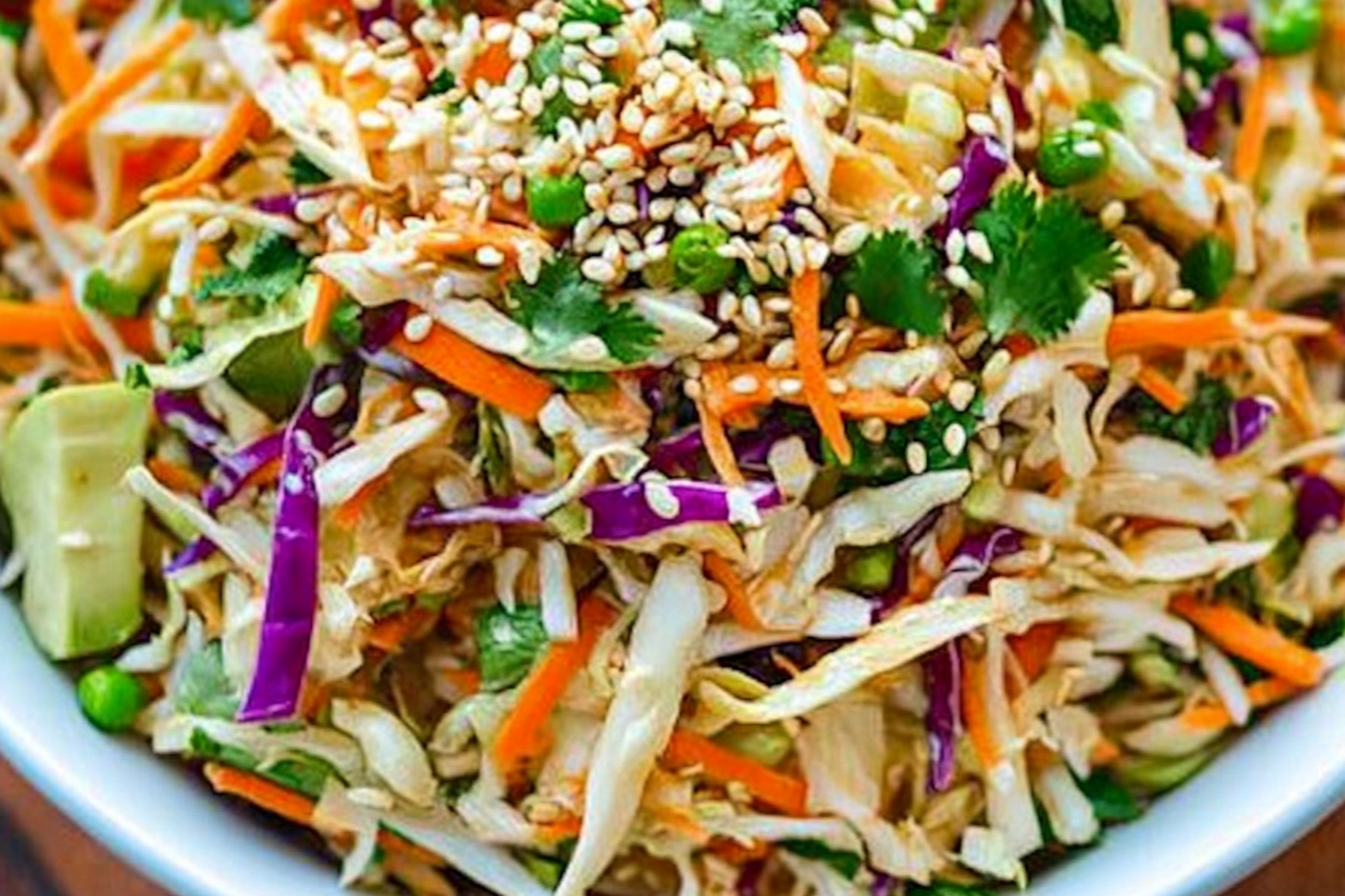 This Simple Asian Slaw is fresh, crunchy, and bursting with flavors! Perfect as a side dish or light meal, it's quick to prepare and a crowd favorite.