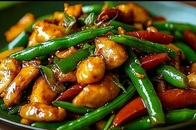 This Thai Chicken Stir Fry with Green Beans is a vibrant and flavorful dish, combining tender chicken, fresh vegetables, and a sweet chili sauce. Perfect for a quick weeknight dinner.