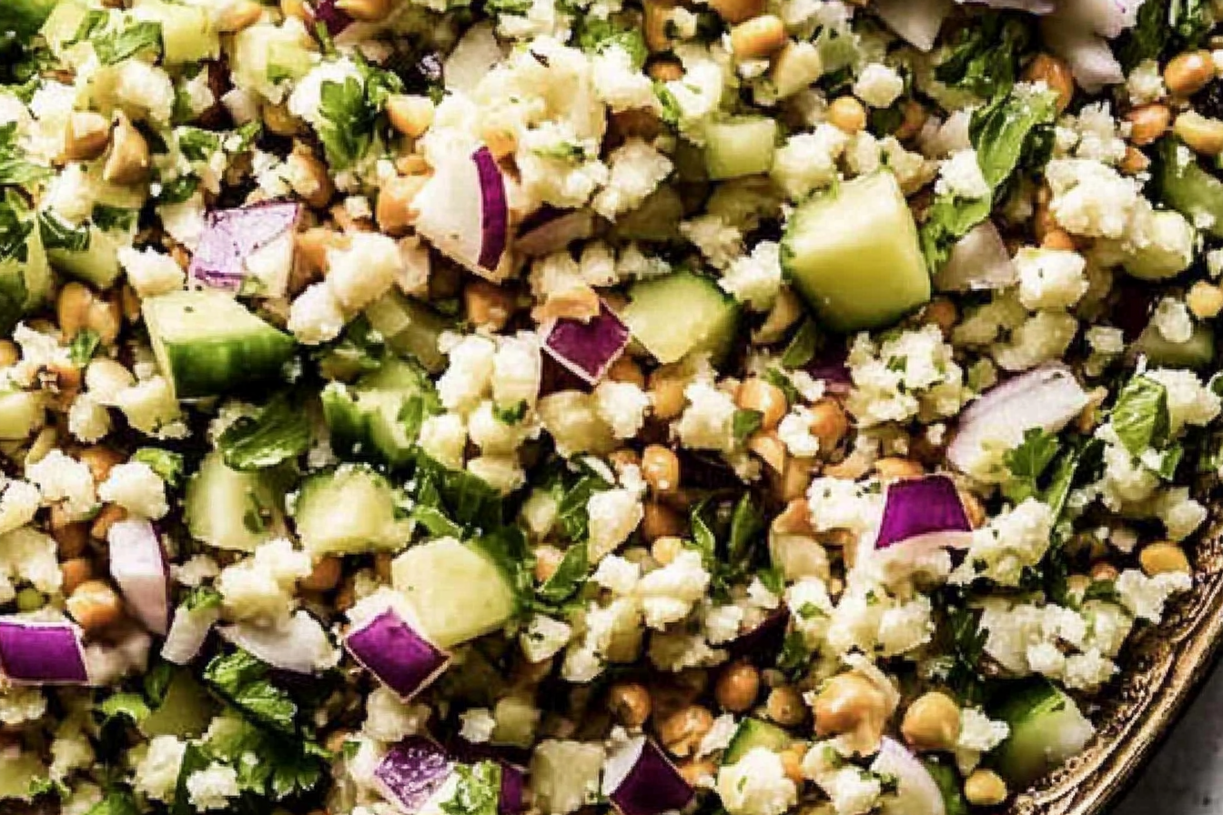 The Jennifer Aniston Salad is a refreshing blend of grains, herbs, and crunchy textures, perfect for a light meal or as a side dish. Plus, it gets even better the next day!