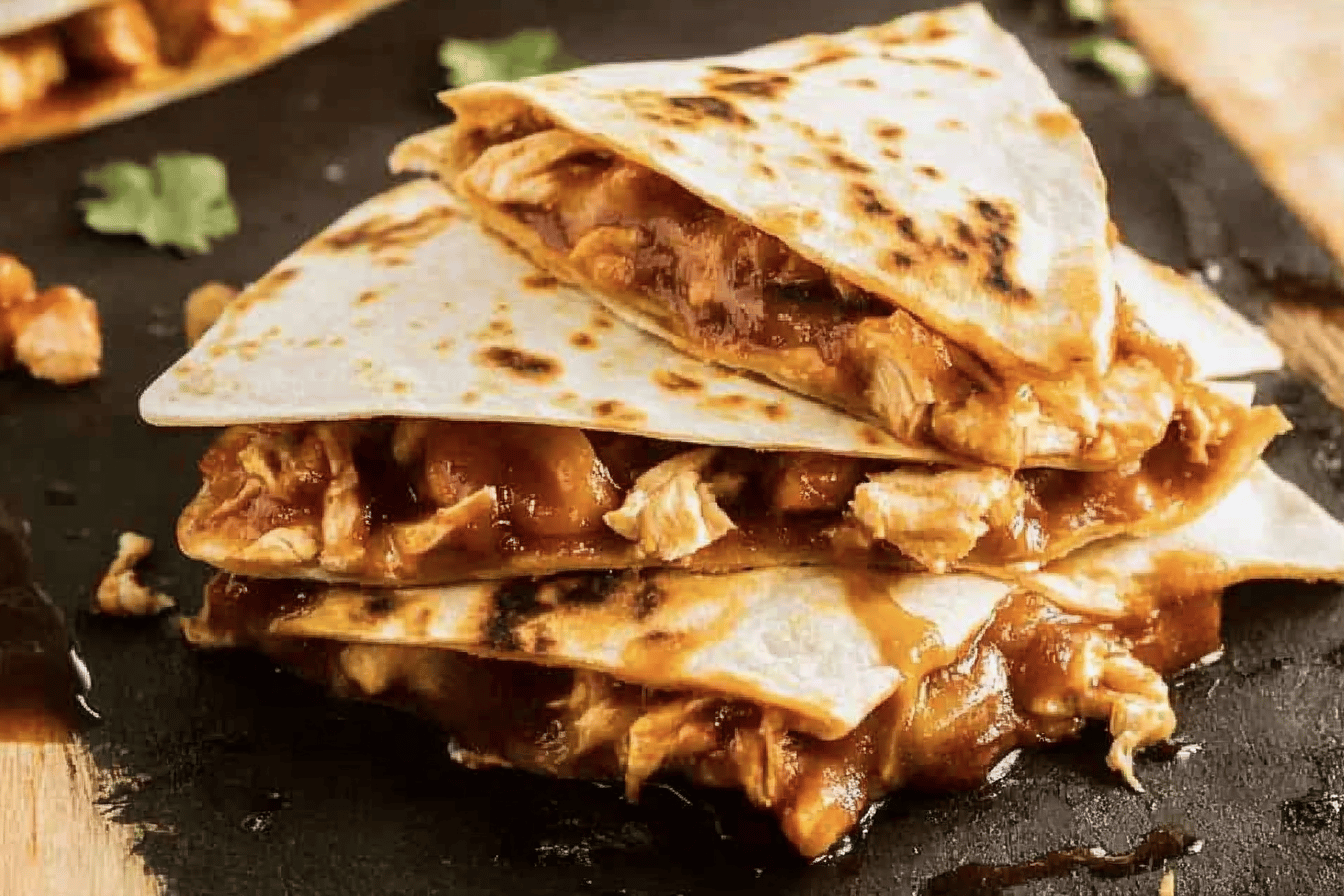 Enjoy a cheesy and savory delight with these easy chicken quesadillas, perfect for any time of the day.