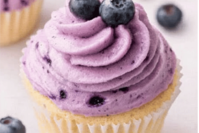 Indulge in heavenly blueberry cream cheese frosting! Perfect for cakes or cupcakes! 🫐🍰