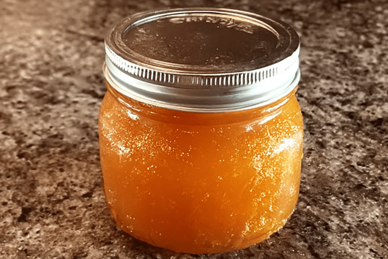 This homemade apricot jam is a delicious way to save money and use fresh fruit! 🍑🍞