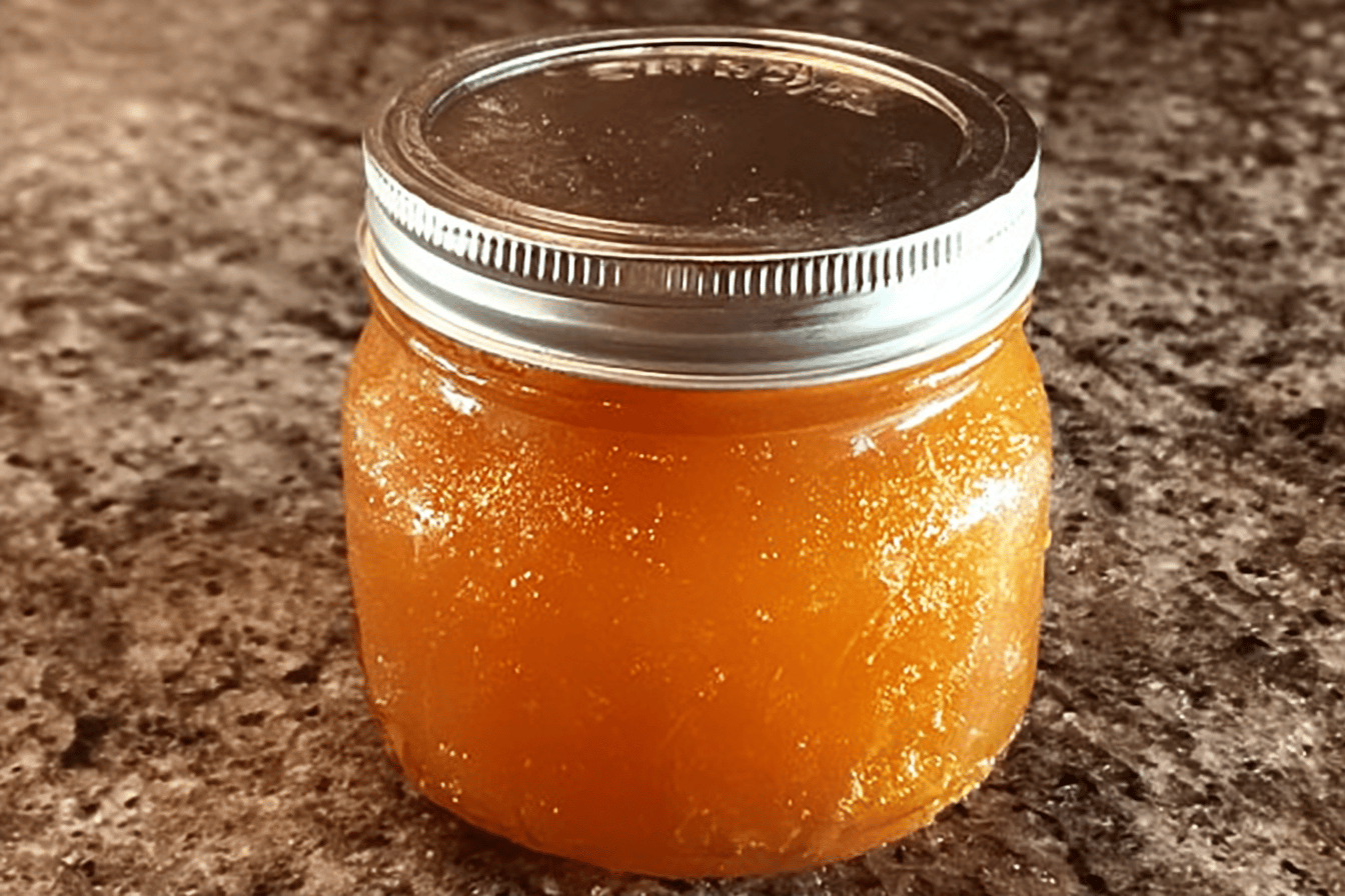 This homemade apricot jam is a delicious way to save money and use fresh fruit! 🍑🍞