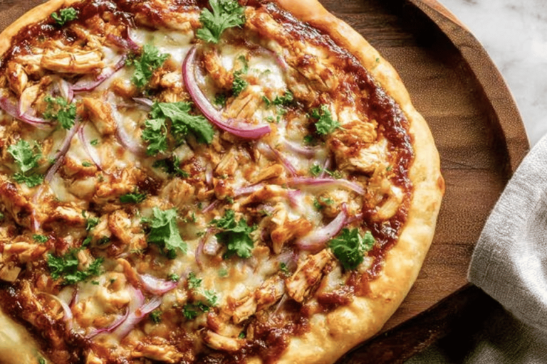 Savor the taste of homemade BBQ chicken pizza that's easy to make and delicious! 🍕🤤