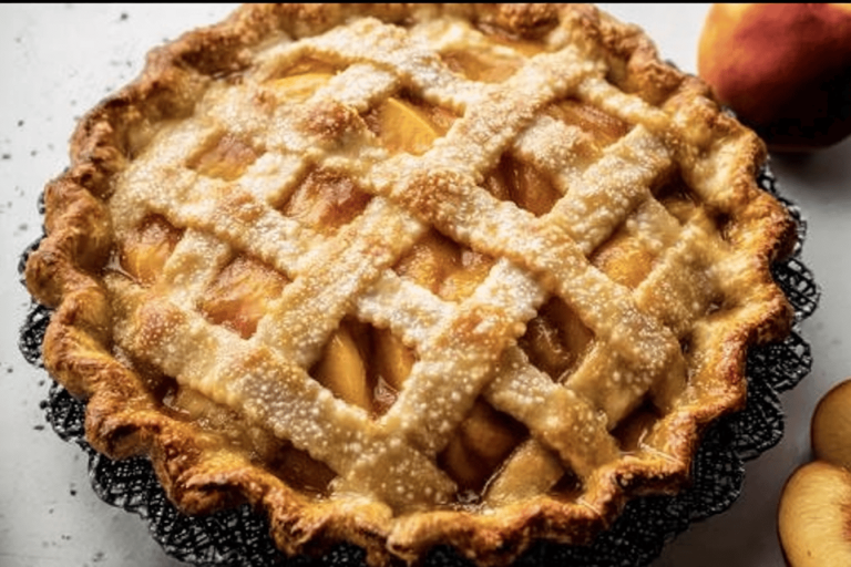 Experience the perfect balance of juicy peaches and a flaky crust in this delightful dessert! 🍑🥧