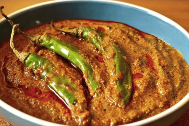 Spice up your meal with this rich and flavorful Mirchi Ka Salan! 🌶️🥥