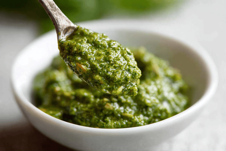 Discover the delicious flavor of Almond Pesto! Perfect for pasta or as a spread. 🌿🍝