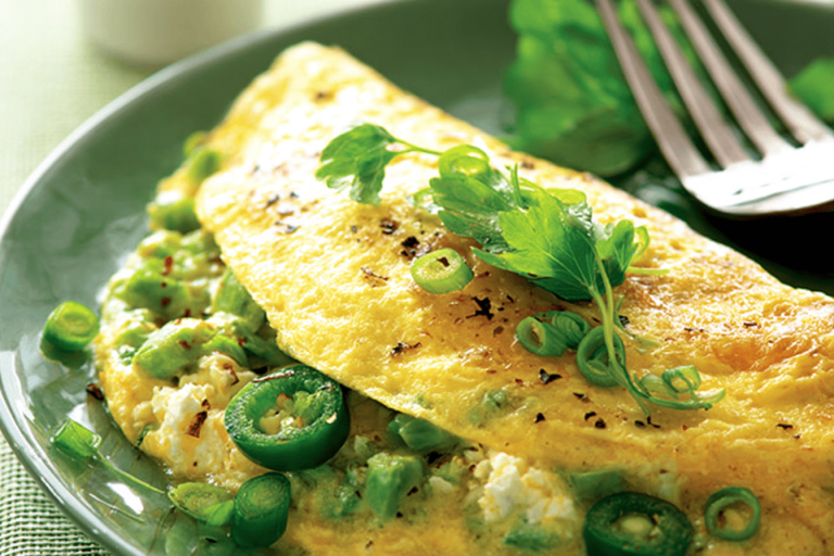 Start your day with a flavorful green chili omelette packed with protein and a kick! 🌶️🥚