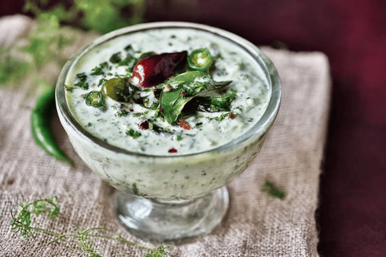 Spice up your meal with this vibrant Green Chili Raita, a perfect cooling dip! 🌶️🥗
