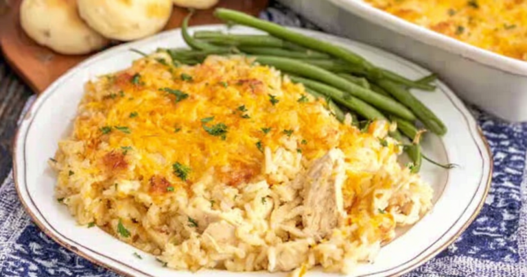 Delicious Angel Chicken and Rice Casserole served warm, garnished with fresh parsley, alongside a colorful side salad.